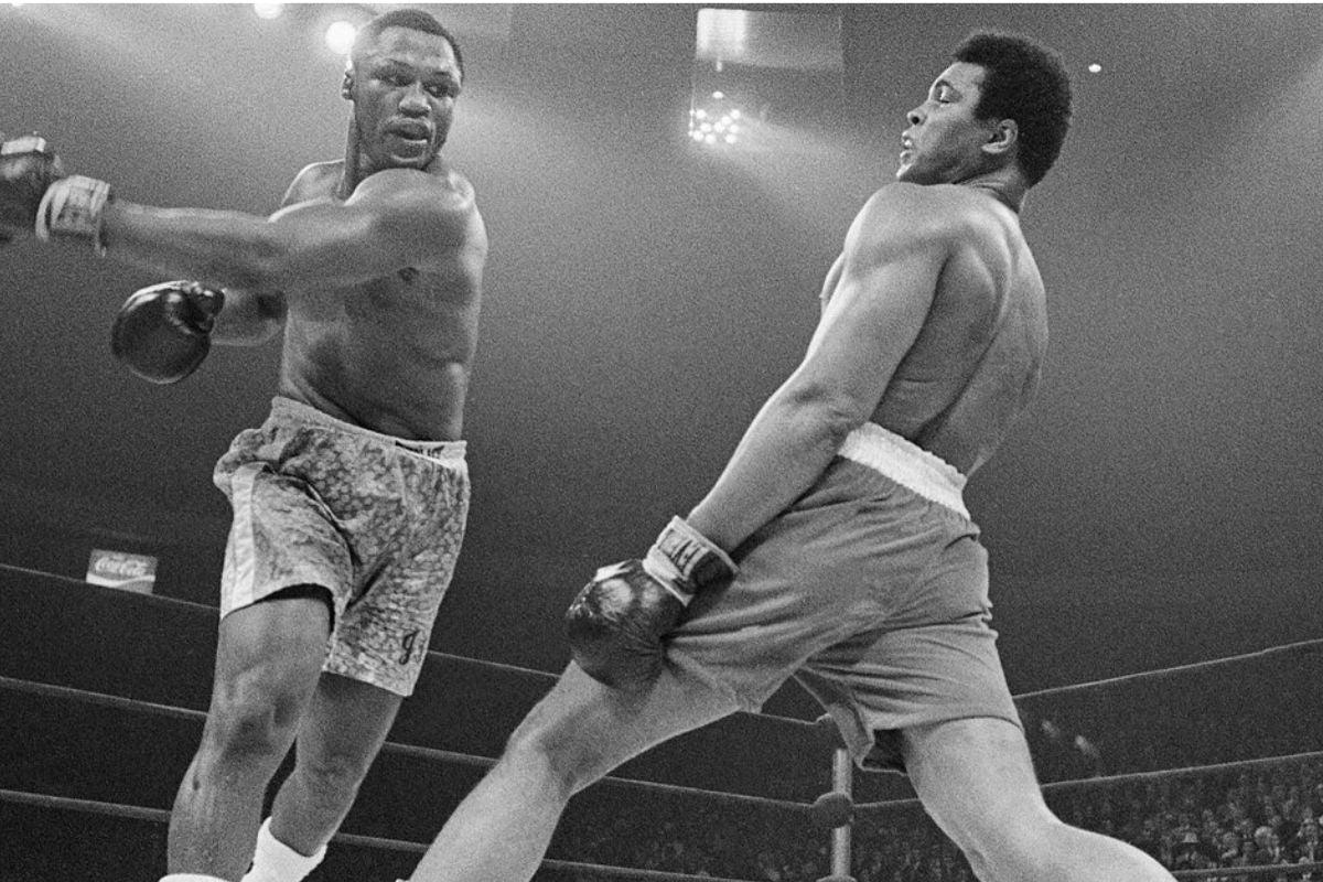 ali dodging slipping a shot from frazier 